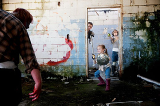 Illustration for article titled Zombie apocalypse family photos are the cutest thing you'll see all day